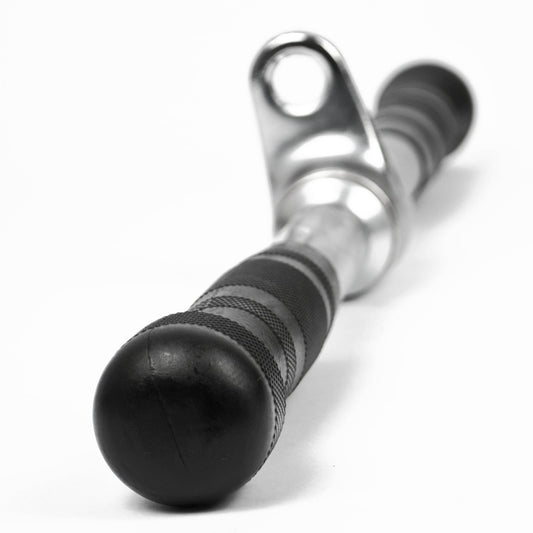 A close-up of a black and silver metal cable pulley system component, featuring a textured black handle with a spherical end cap and a polished silver metal sleeve, set against a plain white background.