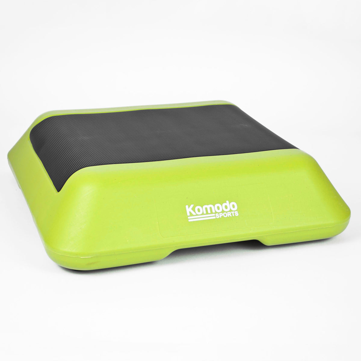 A Kamoda Sports step platform in lime green and black, photographed on a clean white background.