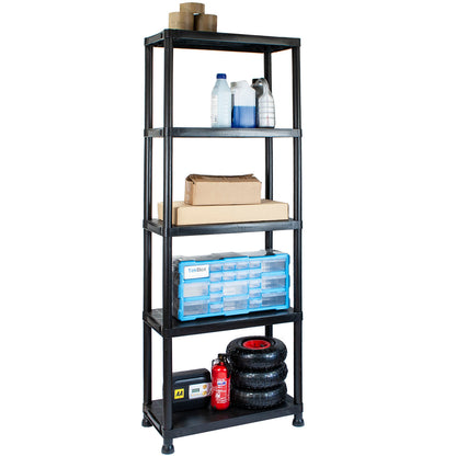 A tall black plastic 5-shelf storage rack with various items placed on the shelves, including plastic bottles, cardboard boxes, blue storage bins, tires, and a fire extinguisher, shown against a plain white background.