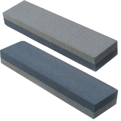 Two rectangular sharpening stones shown on a plain white background, one in gray and one in dark blue-gray, with layered textured surfaces.