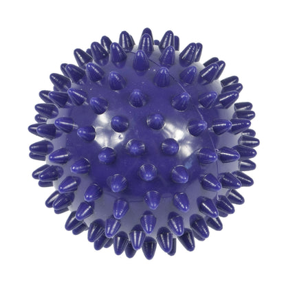 A dark purple spiky massage ball, photographed from a top-down perspective on a solid white background.