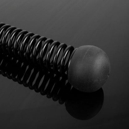 A close-up studio shot of a battle rope bar with a silicon end, photographed on a dark reflective surface.
