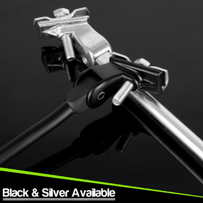 Close-up of a metal bike kick stands with black and silver components on a dark reflective background, with text at the bottom reading 'Black & Silver Available'.