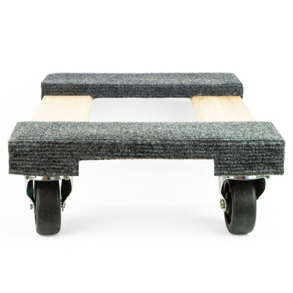A carpeted moving dolly with dark gray textured felt pads and light wood slats, fitted with black caster wheels, shown against a plain white background.