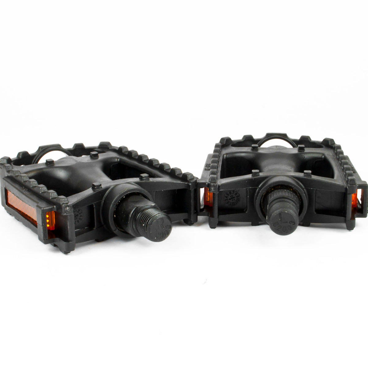 A pair of black bicycle pedals with textured treaded surfaces and orange reflectors, shown on a plain white background.