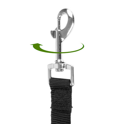 A close-up of a black pet seat belt clip with a silver metal swivel snap hook and a green curved arrow graphic indicating a rotation or fastening action, on a plain white background.
