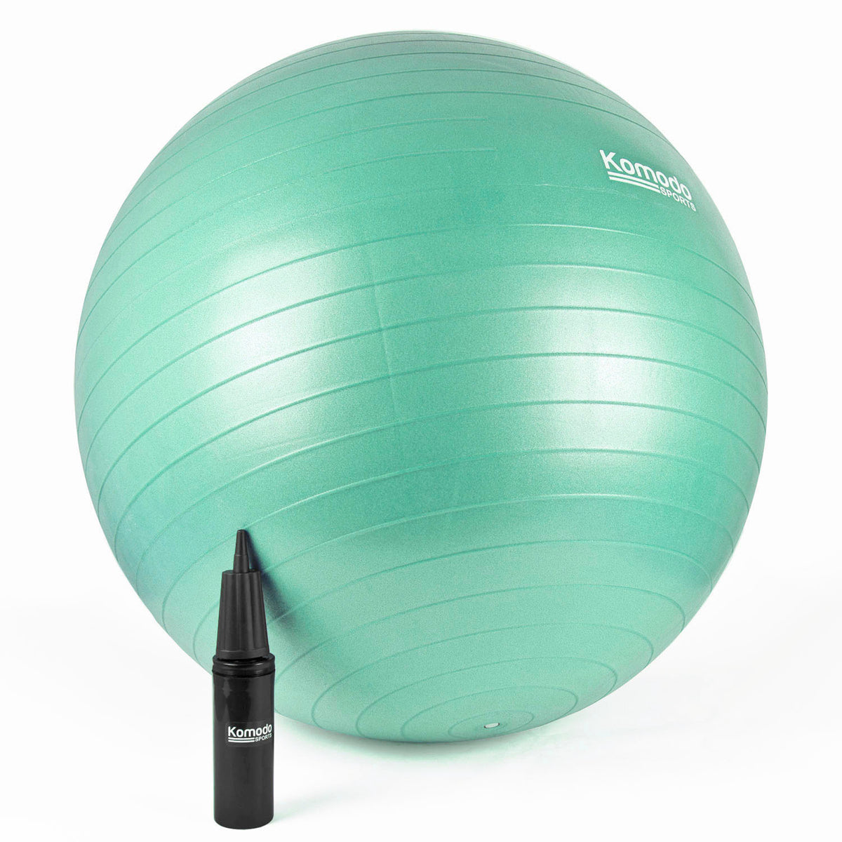 A green Komodo stability exercise ball with a black manual pump, shown on a clean white background.