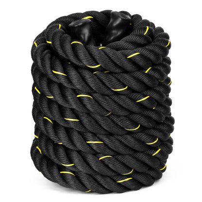 A coiled black battle rope with bright yellow accent stitching, shown on a clean white background.