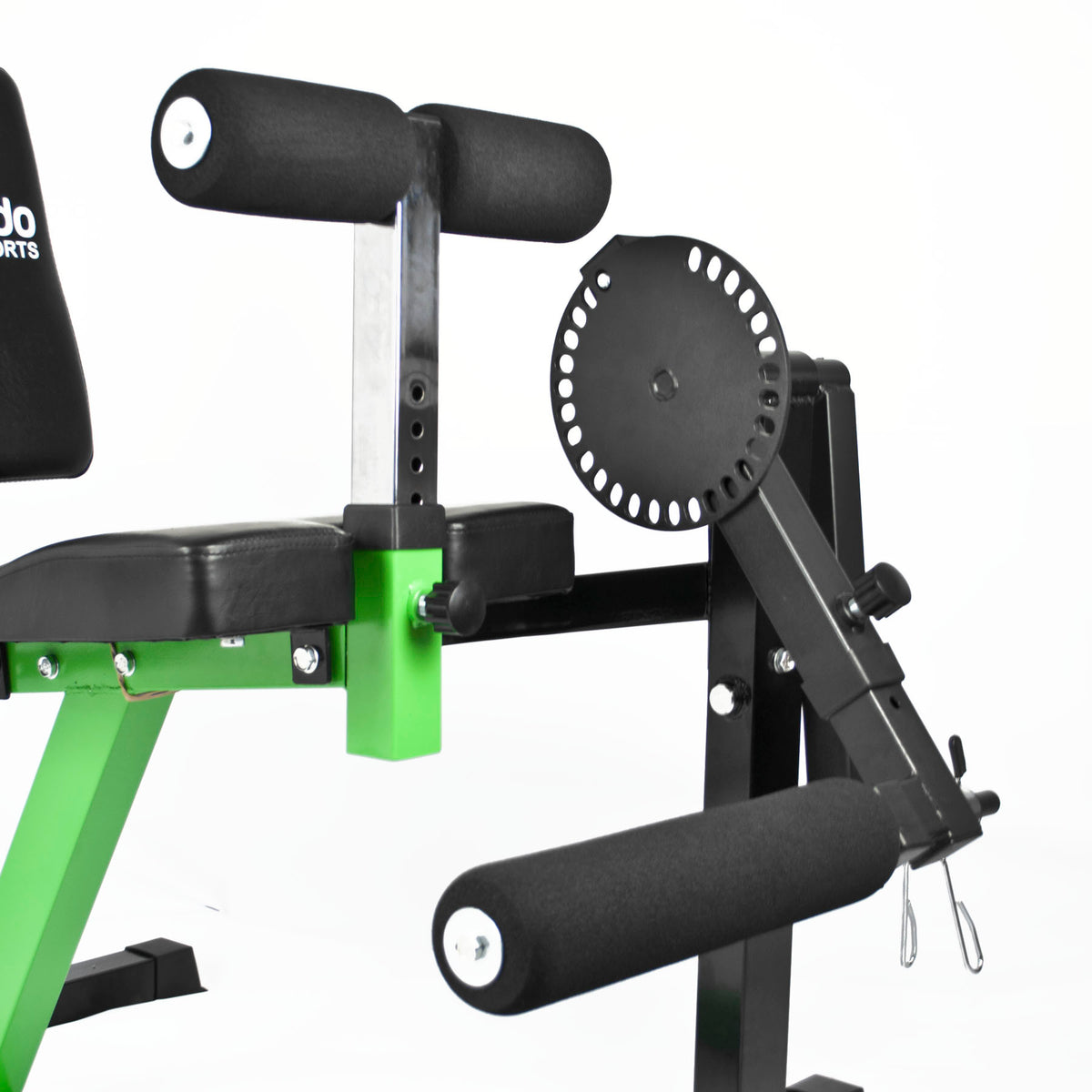 Close-up of a weight bench with black padded foam handles and a bright green metal frame component, photographed on a white studio background.