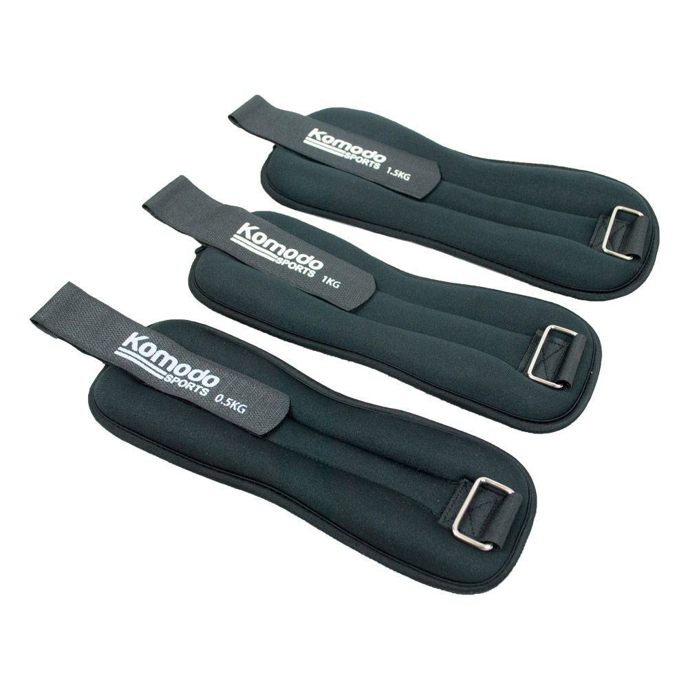Three black Komodo Sports ankle weights in different weight options.