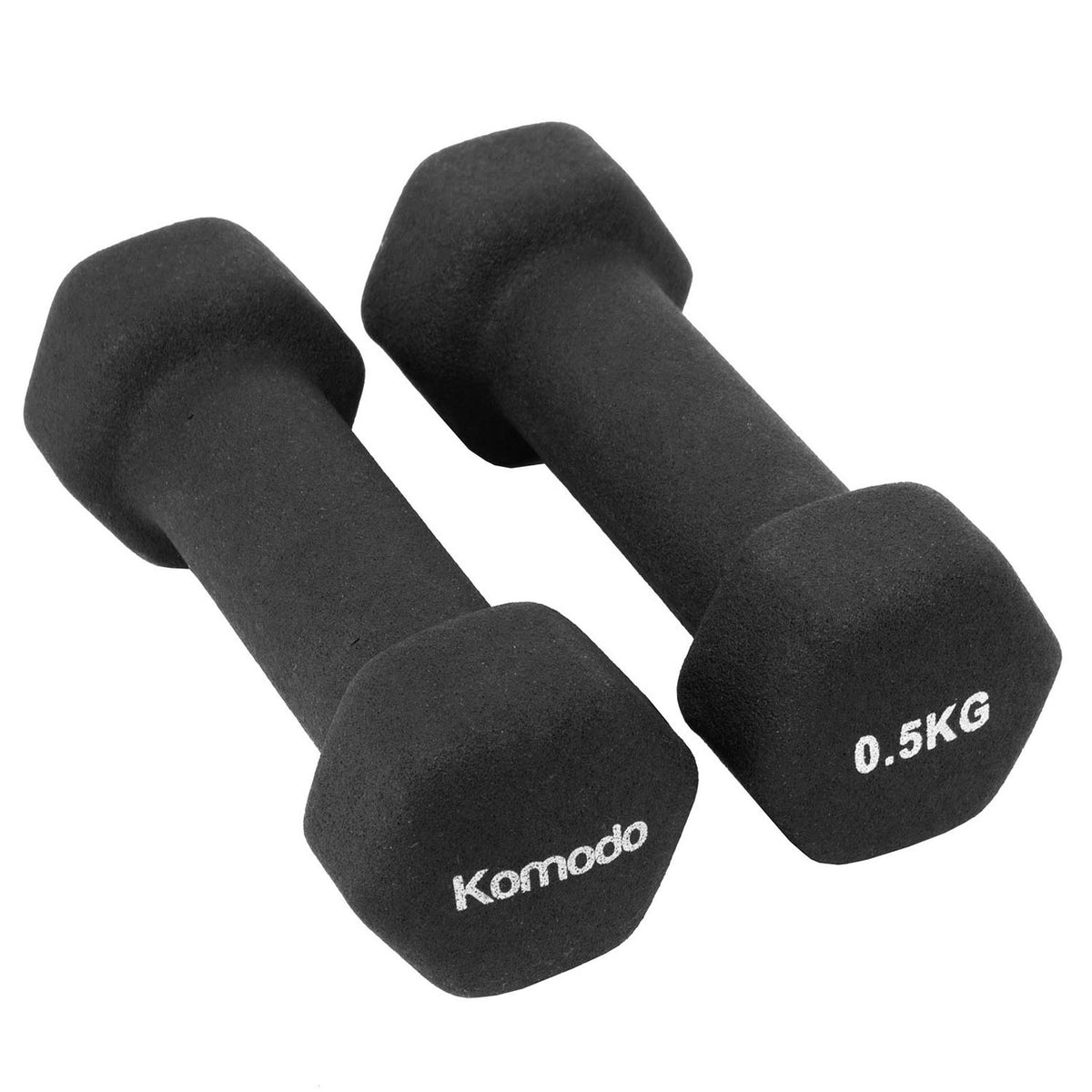 Two black neoprene hex dumbbells on a plain white background, with the left dumbbell showing the Komodo brand name and the right dumbbell showing 0.5KG weight marking.