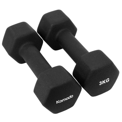 Two black hexagonal dumbbells on a plain white background, with one marked 'Komodo' and the other marked '3KG'.