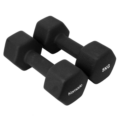 Two black neoprene dumbbells with white printed text reading 'Komodo' and '5KG', shown on a plain white background.