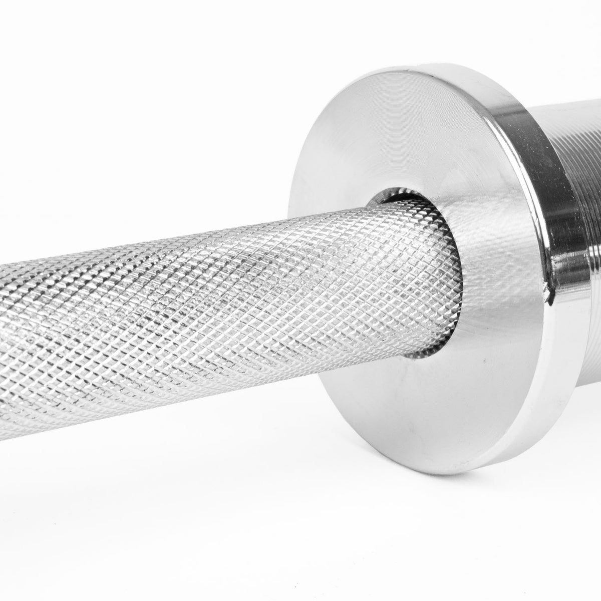 Close-up of a metallic dumbbell showing the knurled textured handle and part of the smooth cylindrical shaft on a white background.