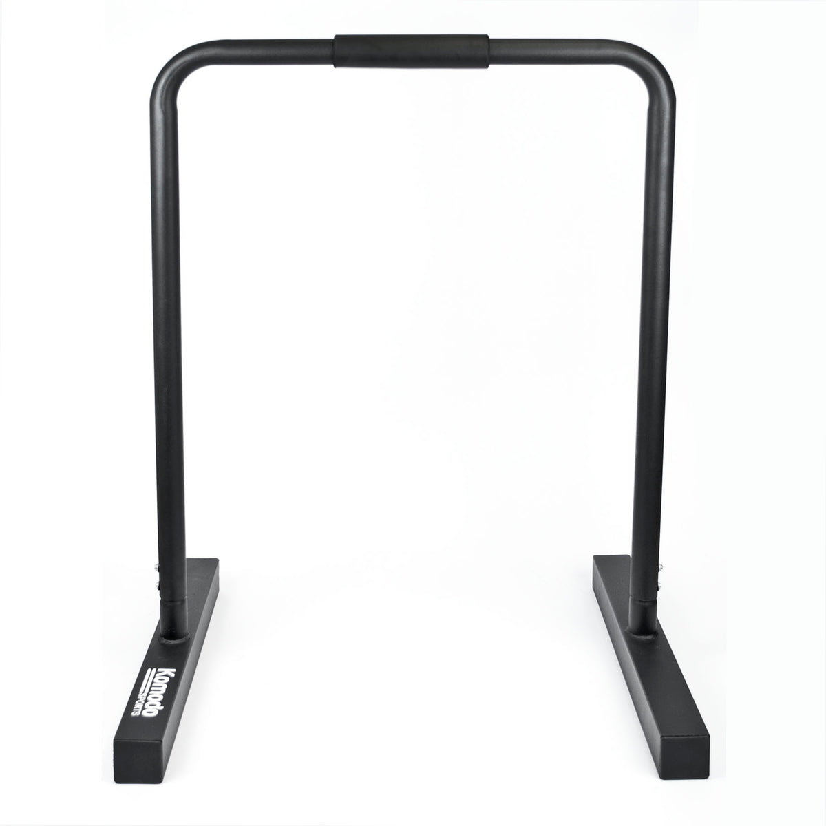 A black metal push-up bar frame with a foam grip on the top bar and a stable rectangular base, shown on a plain white background.