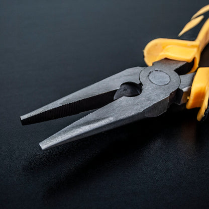 Close-up of a pair of needle-nose pliers with dark gray metal jaws and yellow-and-black handle grips, resting on a dark textured surface.