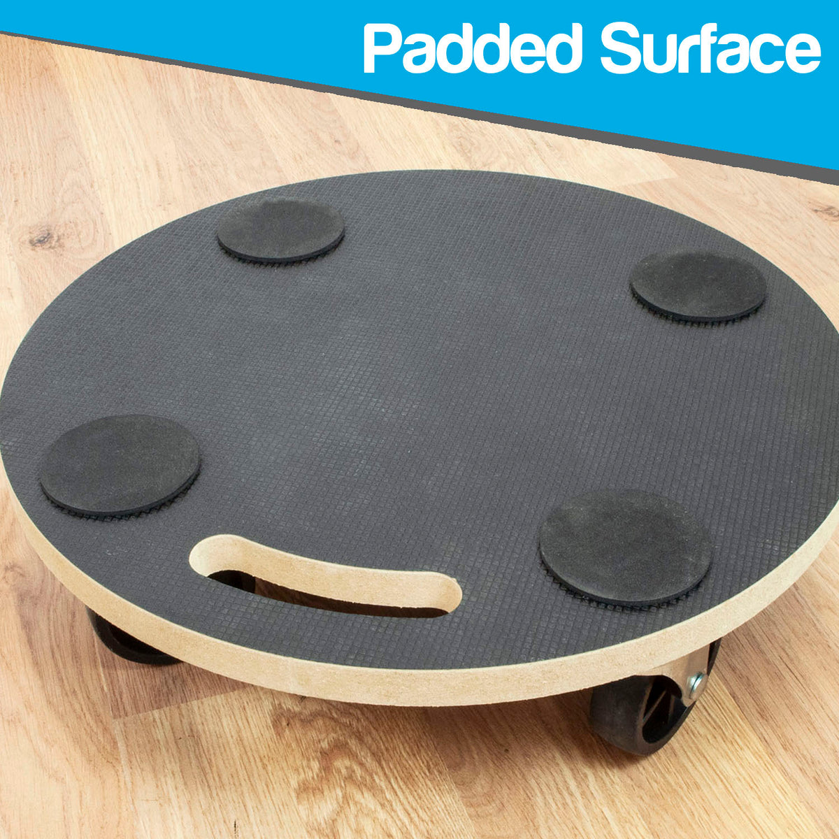 A round wheeled platform with a black padded top surface, four black rubber feet, and a light wood edge, shown on a wood floor. A blue banner at the top reads 'Padded Surface'.