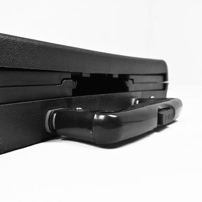 Black plastic handle and locking system on a white background