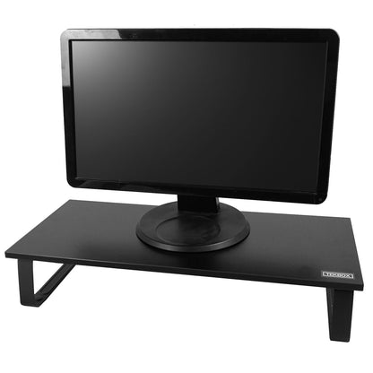 A black monitor riser desk stand holding a black computer monitor, shown against a plain white background. The brand name 'TEKBOX' is visible on the bottom right corner of the desk surface.