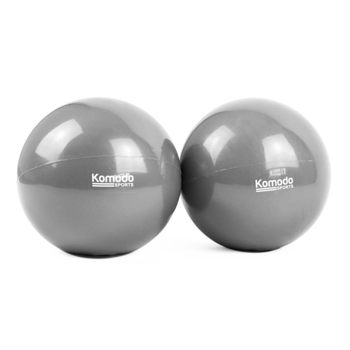 Two dark gray Komodo Sports Weighted Toning Ball  positioned side-by-side on a clean white background.