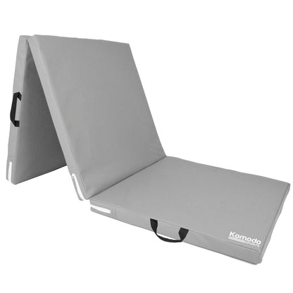 Gray folding mat with handles on a white background