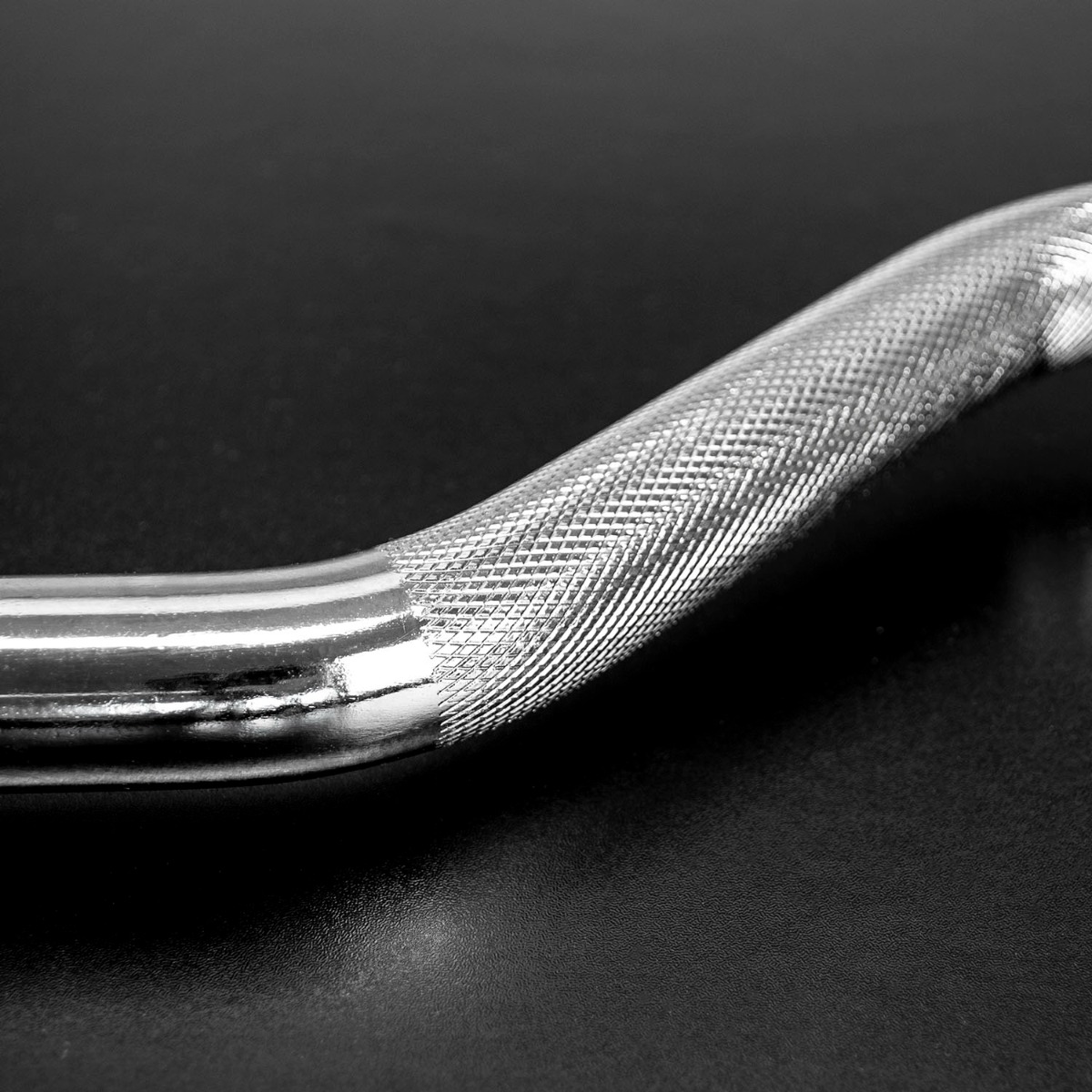 4ft steel curl barbell with spinlock collars and knurled grip sections for secure weight lifting sessions