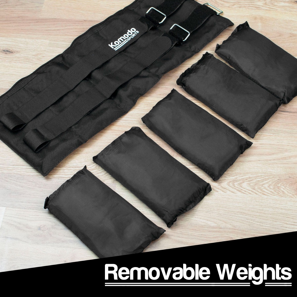 Pair of adjustable black fitness ankle weights with Velcro straps and removable 1kg weight segments totaling 10kg