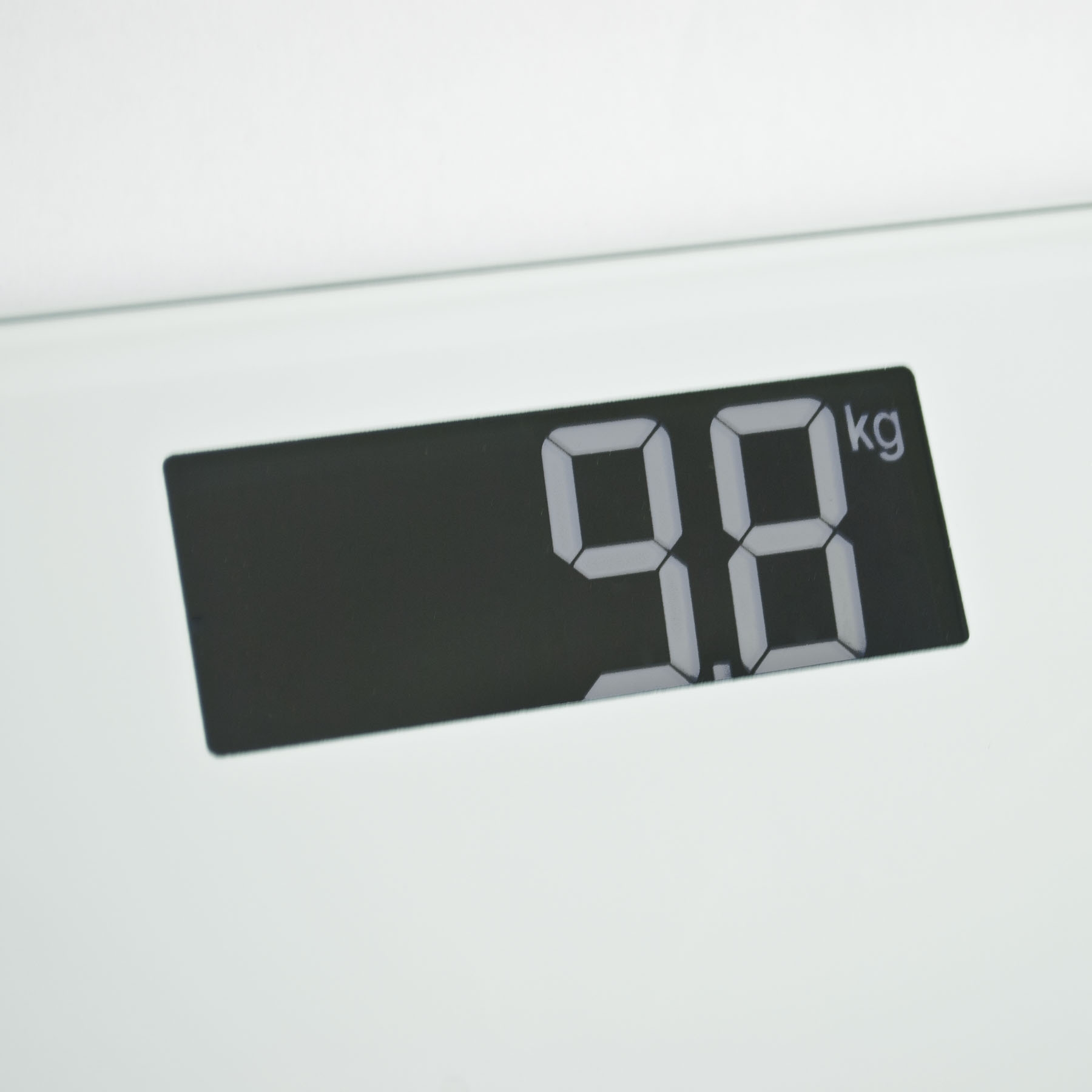 Tempered glass bathroom scales digital with clear digital display showing weight in kg, lbs, or stones and lbs