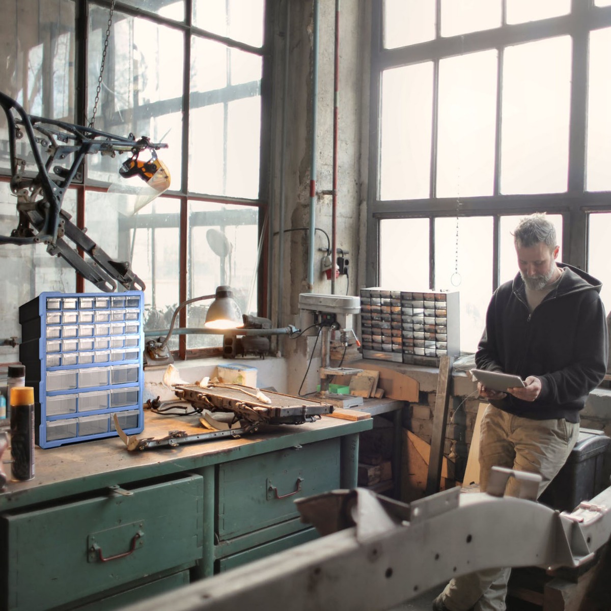 Storage organiser unit with 39 clear plastic drawers in various sizes, stackable and wall-mountable for DIY storage needs