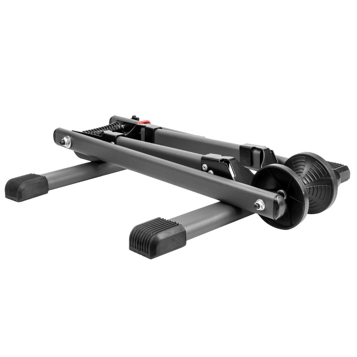 Spring loaded bike stand holding a bicycle upright with folding steel frame and rubber feet for stability on floor
