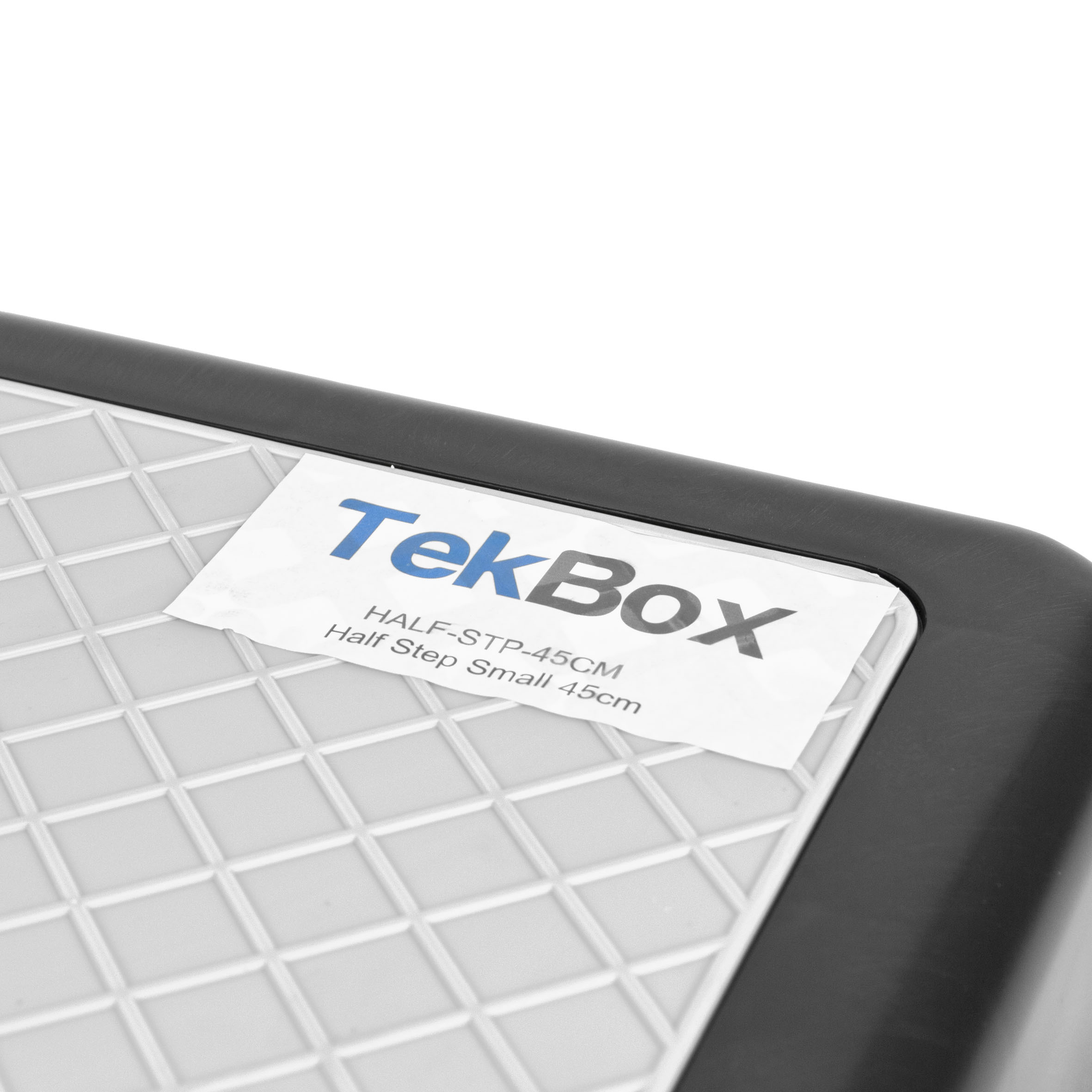 Black rubber anti-slip half step for doorways with drainage holes, measuring 45cm by 36cm, 9.5cm high.