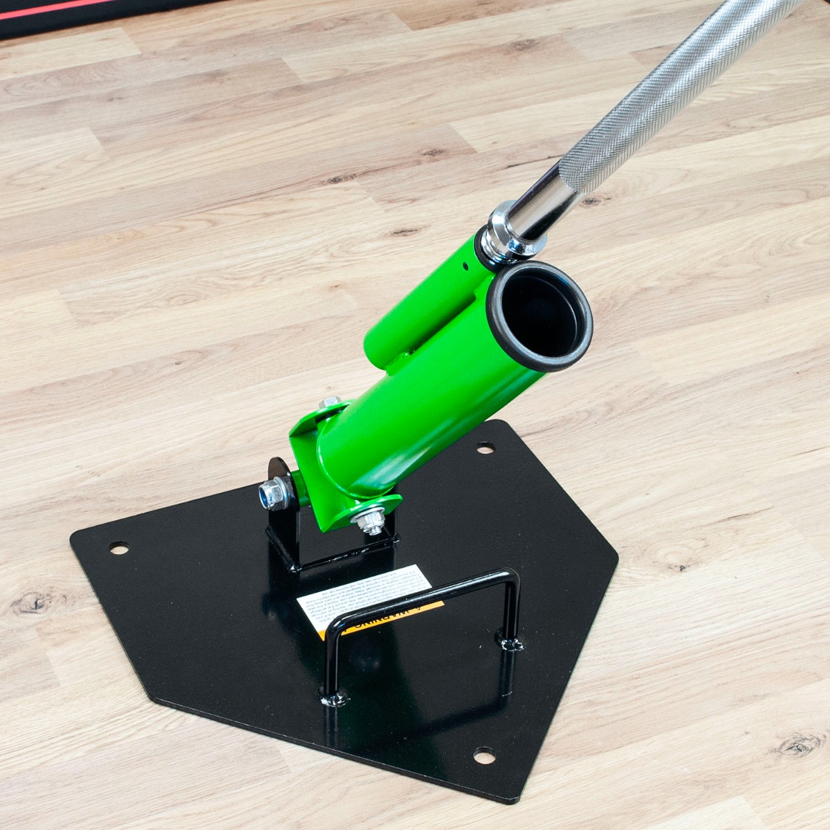 Heavy duty black and green landmine grappler with dual bar sockets for 1 inch and Olympic bar workout stability