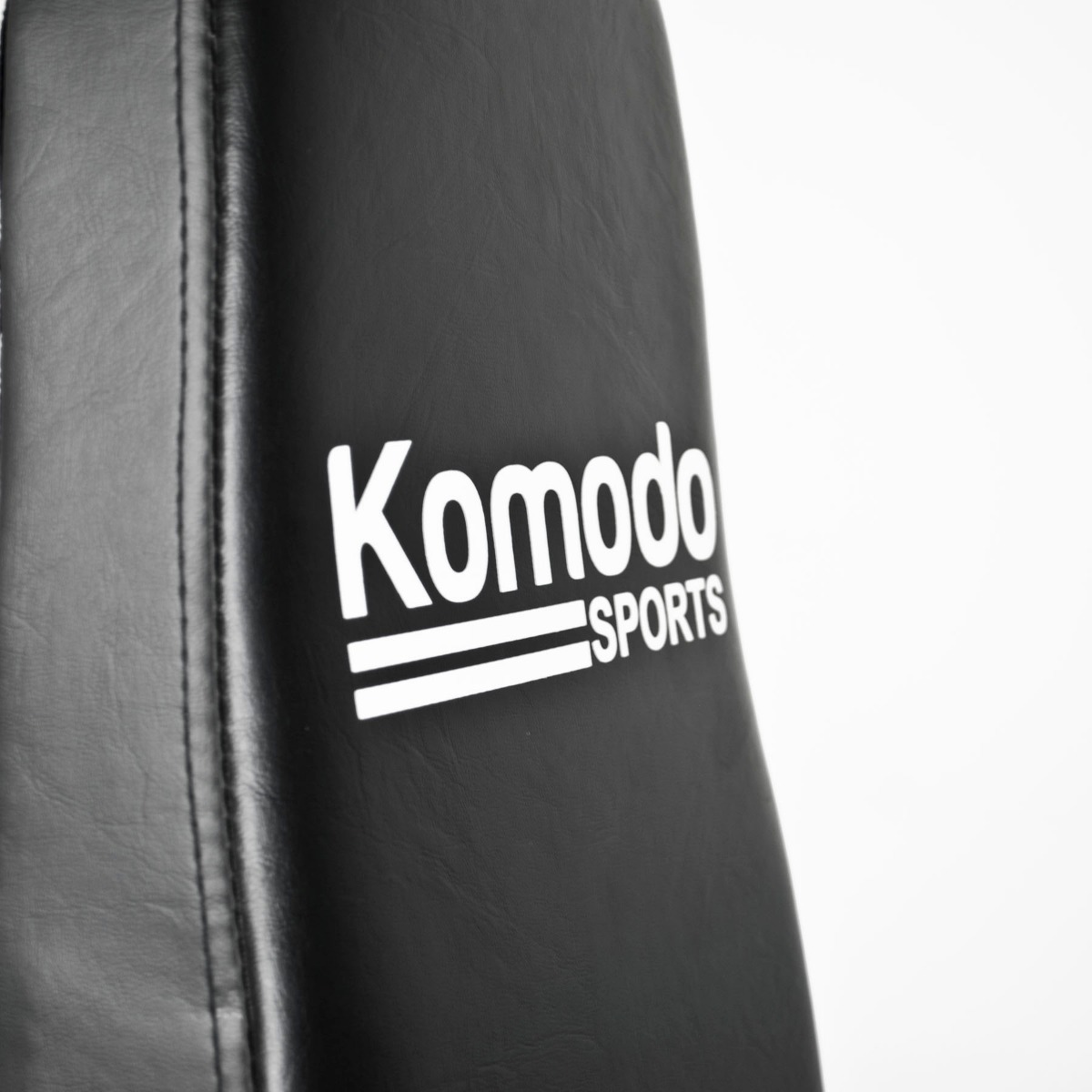 Adjustable leg extension machine with padded seat and weight plates, heavy-duty leg workout equipment for home gym use