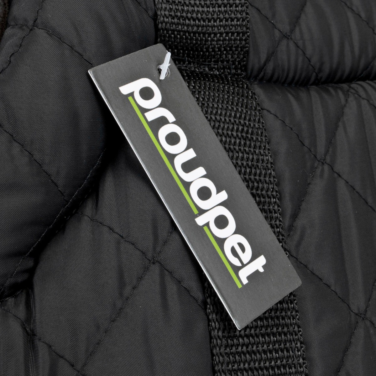 Black quilted stylish pet carrier with zipped top and side pocket, showing soft padded interior for small pets comfort