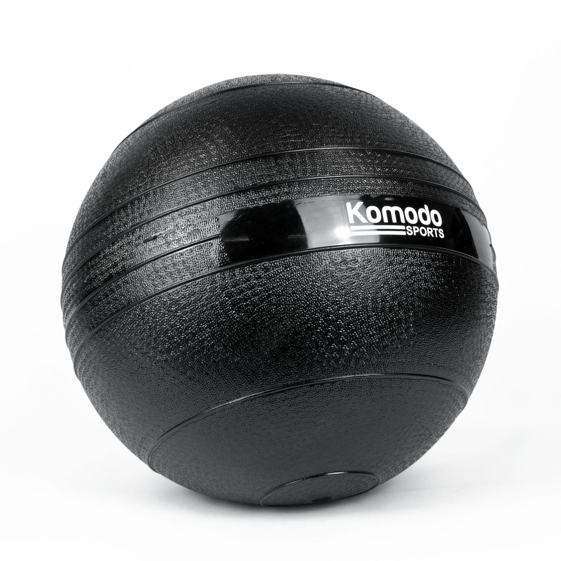 Komodo 6KG sand filled slam ball with textured vinyl cover resting on a white background for full body workouts