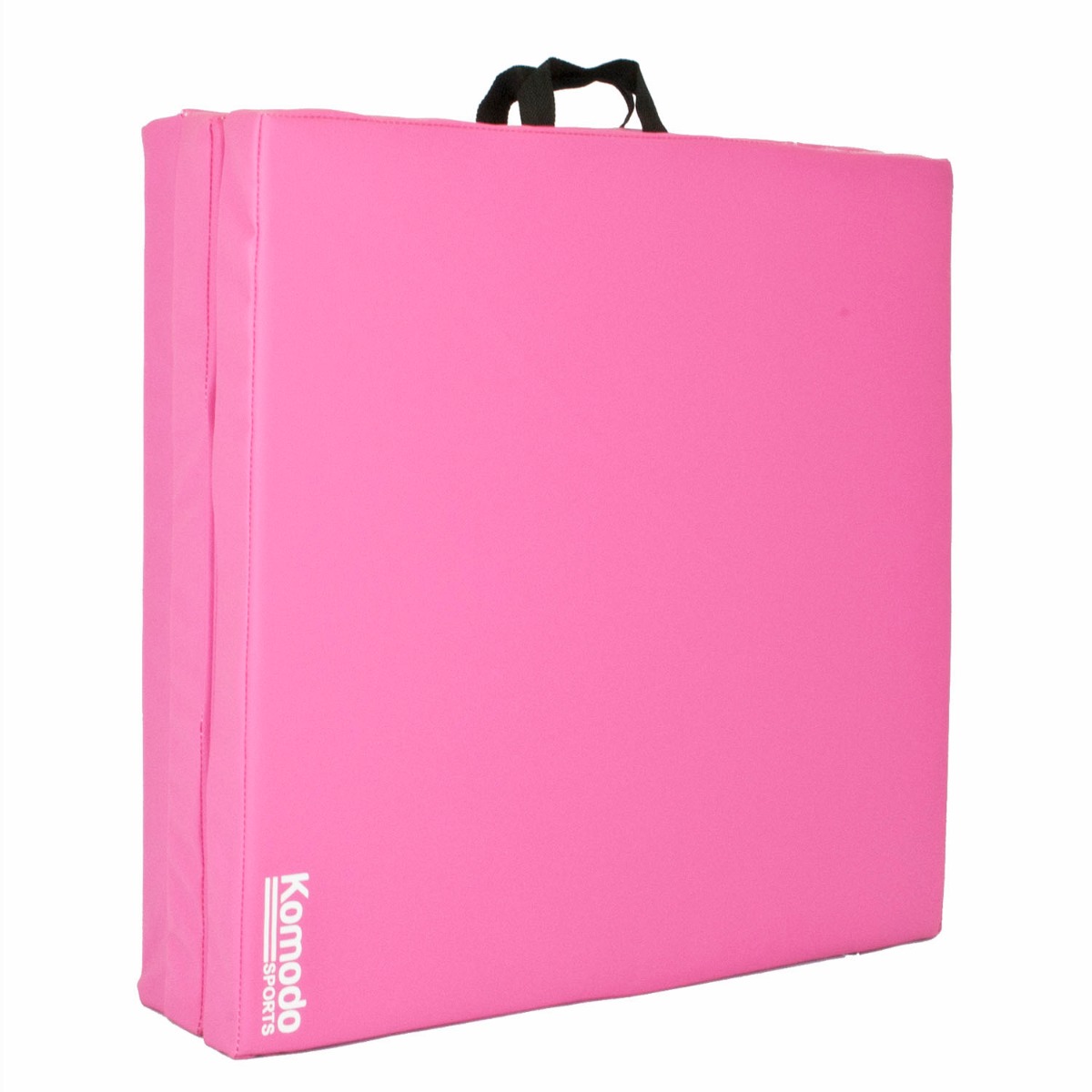Pink Komodo tri folding yoga mat folded with built-in handles for easy carrying and compact storage on white background
