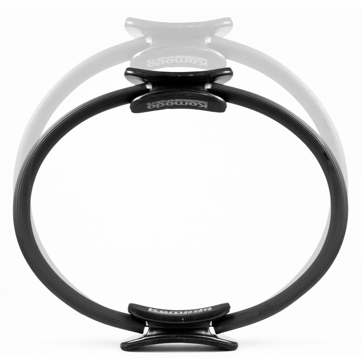 Black 15 inch pilates fitness ring with foam padded curved handles for comfortable grip during workouts and stretches