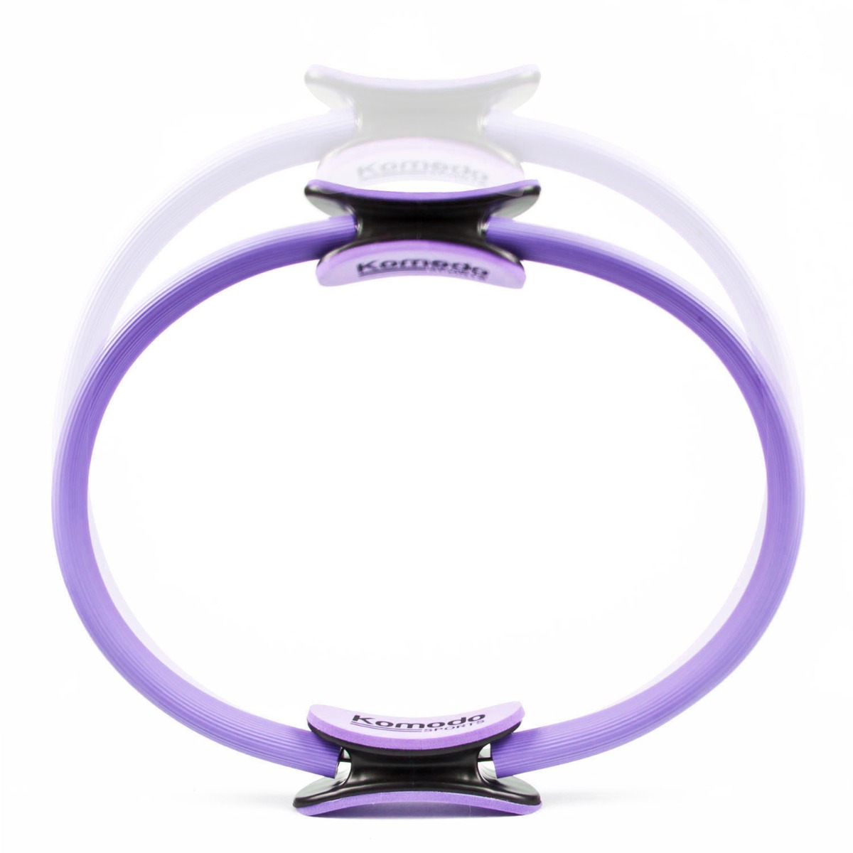 Purple Pilates ring with foam padded handles on a white background, designed for yoga and Pilates workouts.